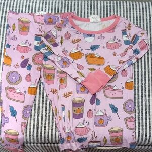 Never worn. Cozy Pink Kids Pajama Set with Dessert Print